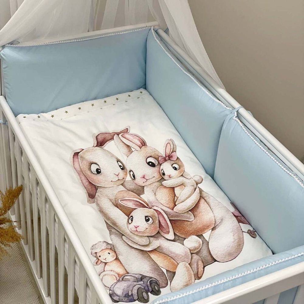 Постільні комплекти в ліжечко для новонароджених