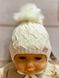 Зимова шапка Павутинка для новонародженої молочна